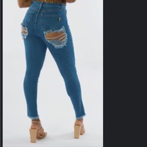 Cheeky denim jeans/ Fashion Nova/ ladies /size 3/4, fashion rips/ never worn